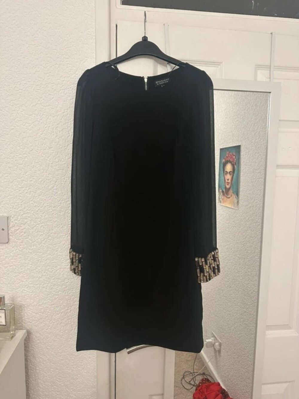 Mid length black dress